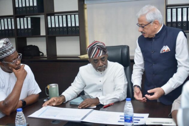 The Executive Secretary of the National Sugar Development Council (NSDC), Mr. Kamar Bakrin (M); his Senior Adviser, Mr. Teslim Bello (L); and the representative of India’s Uttam Sucrotech International, Mr. Sanjiv Gulati (R), at the meeting